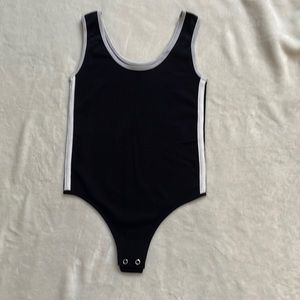 Suzette Body Suit, Black with whitedetails. one size fits all,but likely XS to M